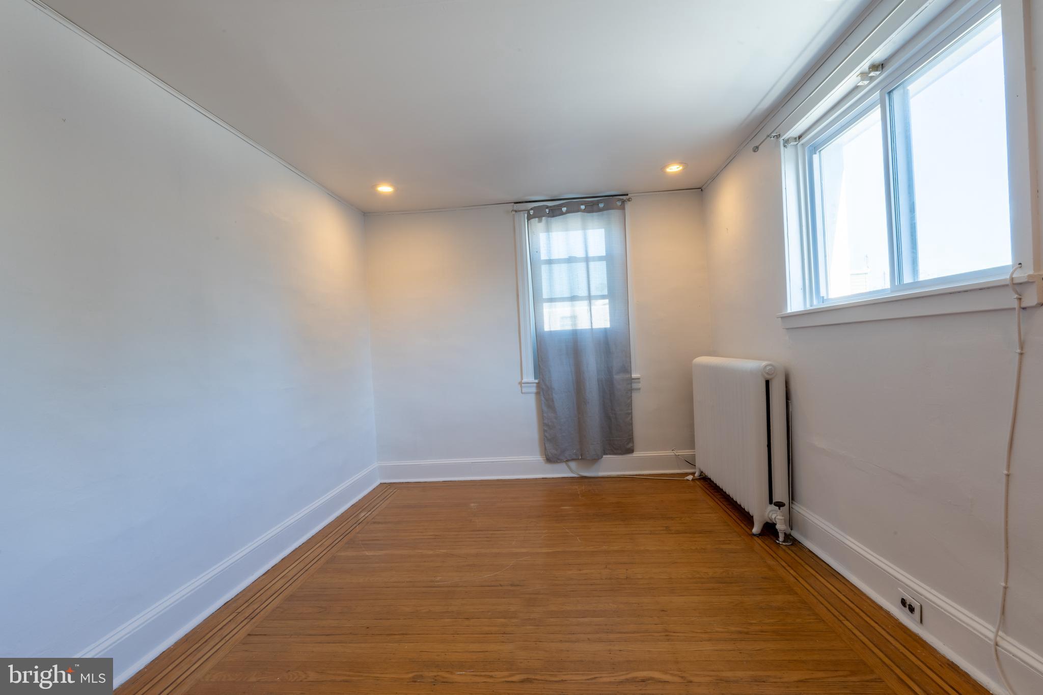 3618 Emerald Street Philadelphia, PA 19134 - Photo 9 of 34 a view of an empty room with a window
