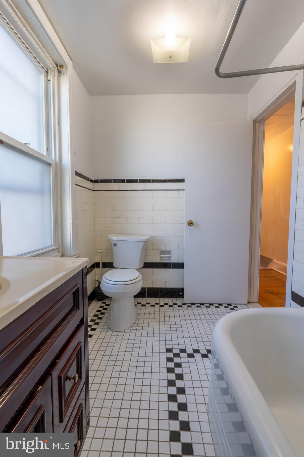 3618 Emerald Street Philadelphia, PA 19134 - Photo 10 of 34 a bathroom with a sink and a bathtub