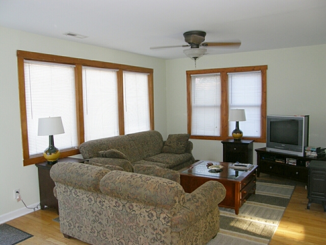 130 Bay Road Fox Lake, IL 60020 - Photo 14 of 21 a living room with furniture and a flat screen tv