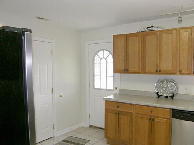 130 Bay Road Fox Lake, IL 60020 - Photo 8 of 21 a kitchen with stainless steel appliances granite countertop a refrigerator and a sink