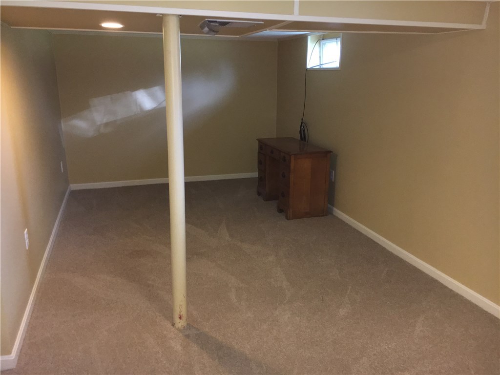 34 Ruth Street Pawtucket, RI 02861 - Photo 22 of 25 Finished room in basement for playroom, man cave or rec room