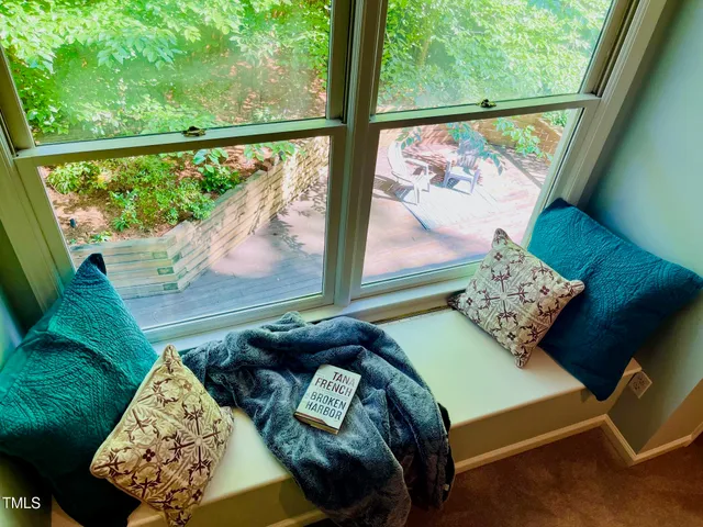 a bathroom with a sink toilet and mirror