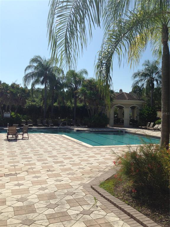 3355 South Kirkman Road, Unit 1324 Orlando, FL 32811 - Photo 17 of 19 a view of swimming pool with a garden