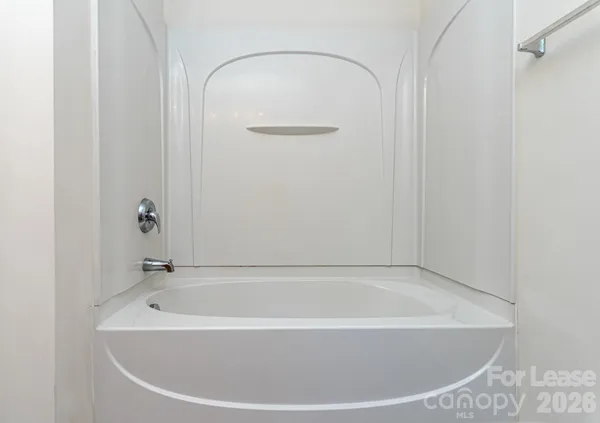 a view of a bathtub in a bathroom