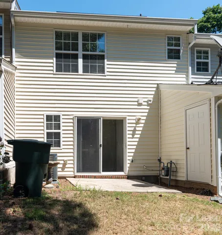 a view of a house with a door and a window