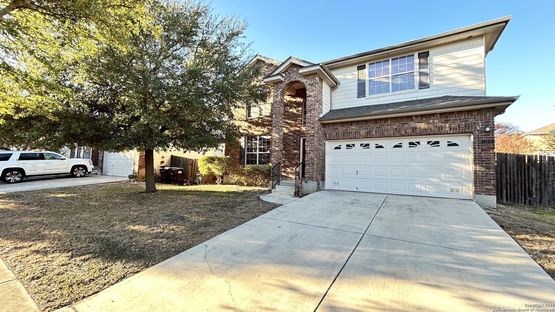 11015 Mustang Spring San Antonio, TX 78254 - Photo 1 of 29 a view of a car park in front of a house