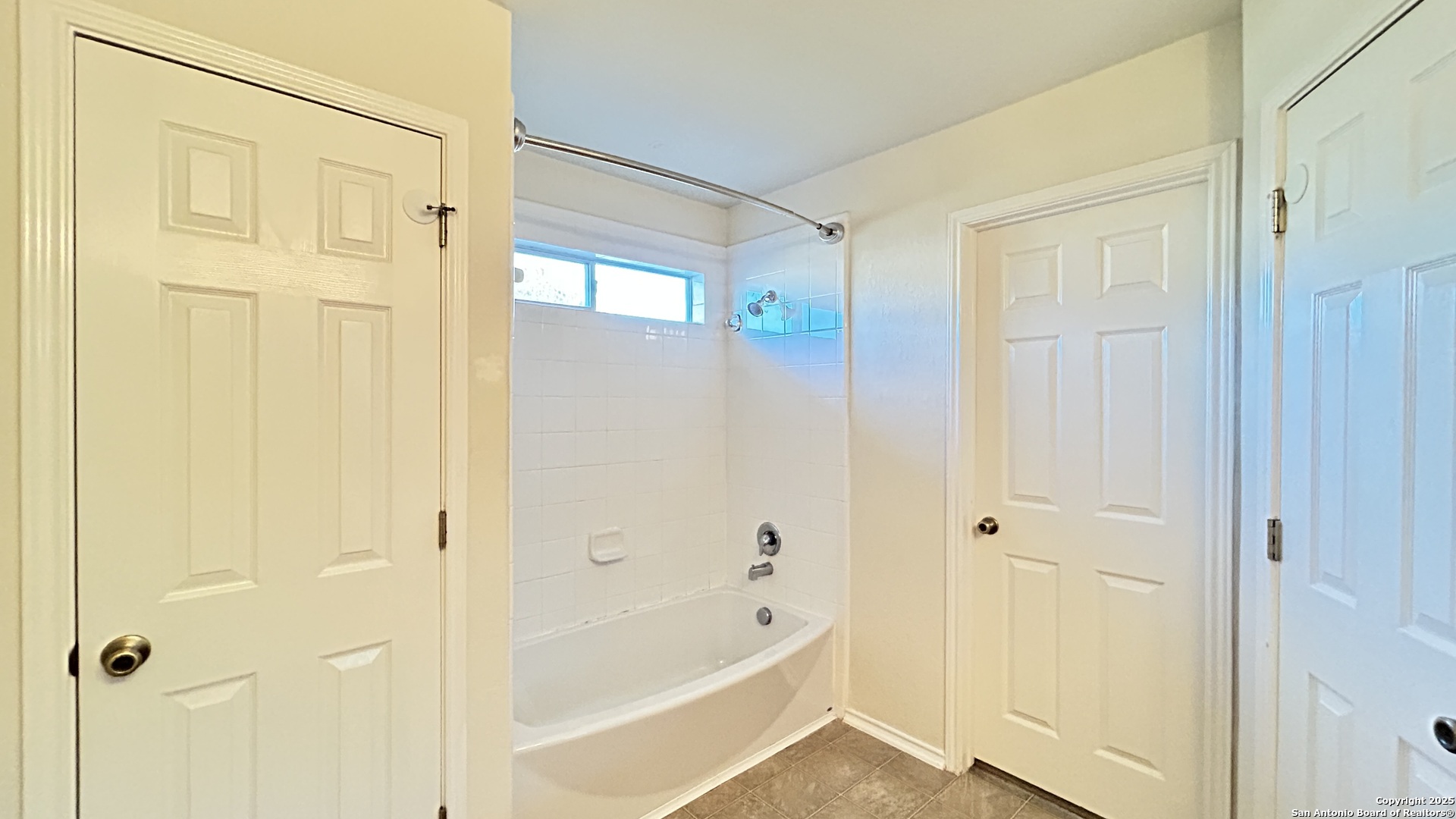 11015 Mustang Spring San Antonio, TX 78254 - Photo 17 of 29 a bathroom with a bathtub and shower