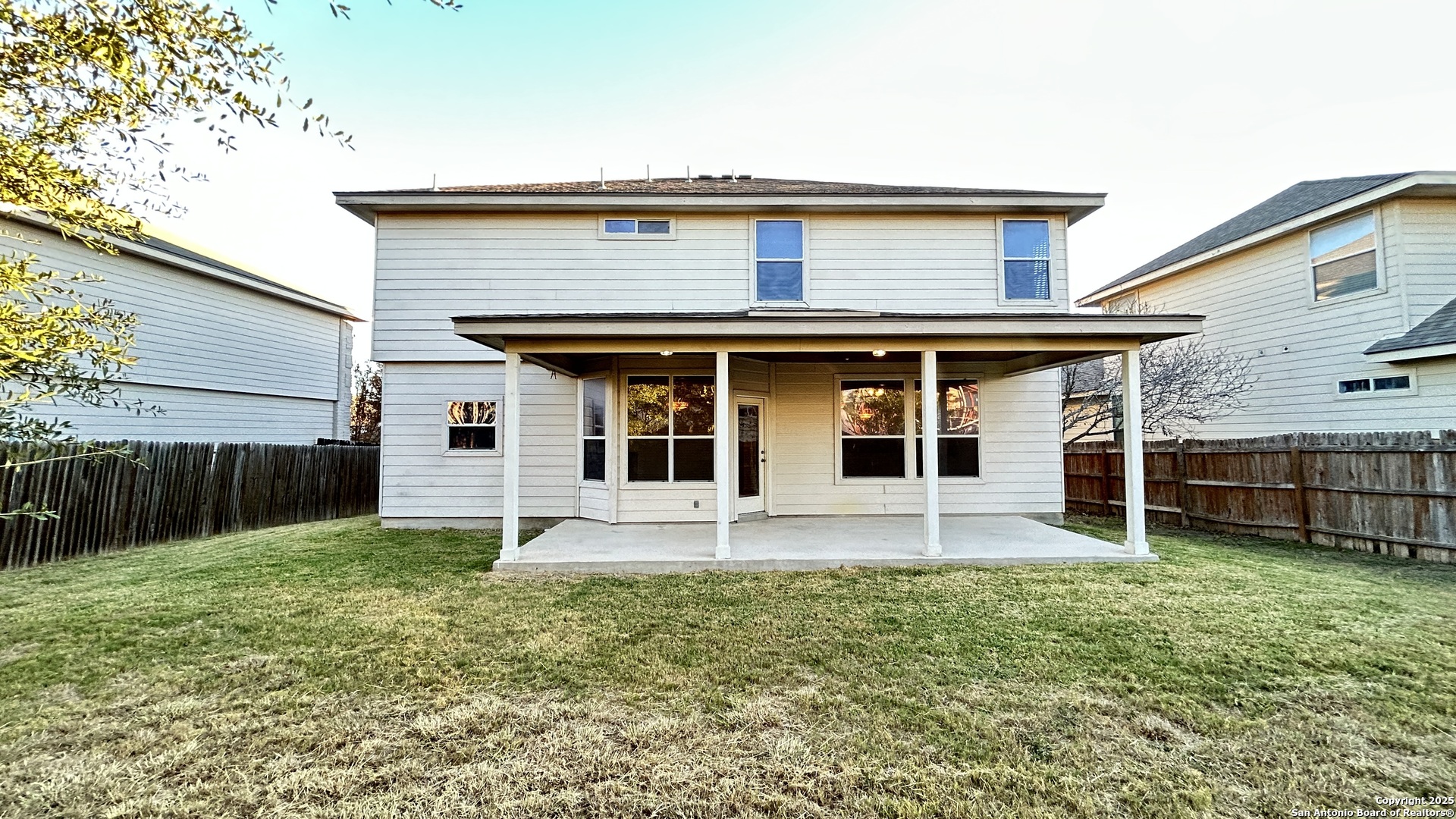 11015 Mustang Spring San Antonio, TX 78254 - Photo 28 of 29 front view of a house with a yard