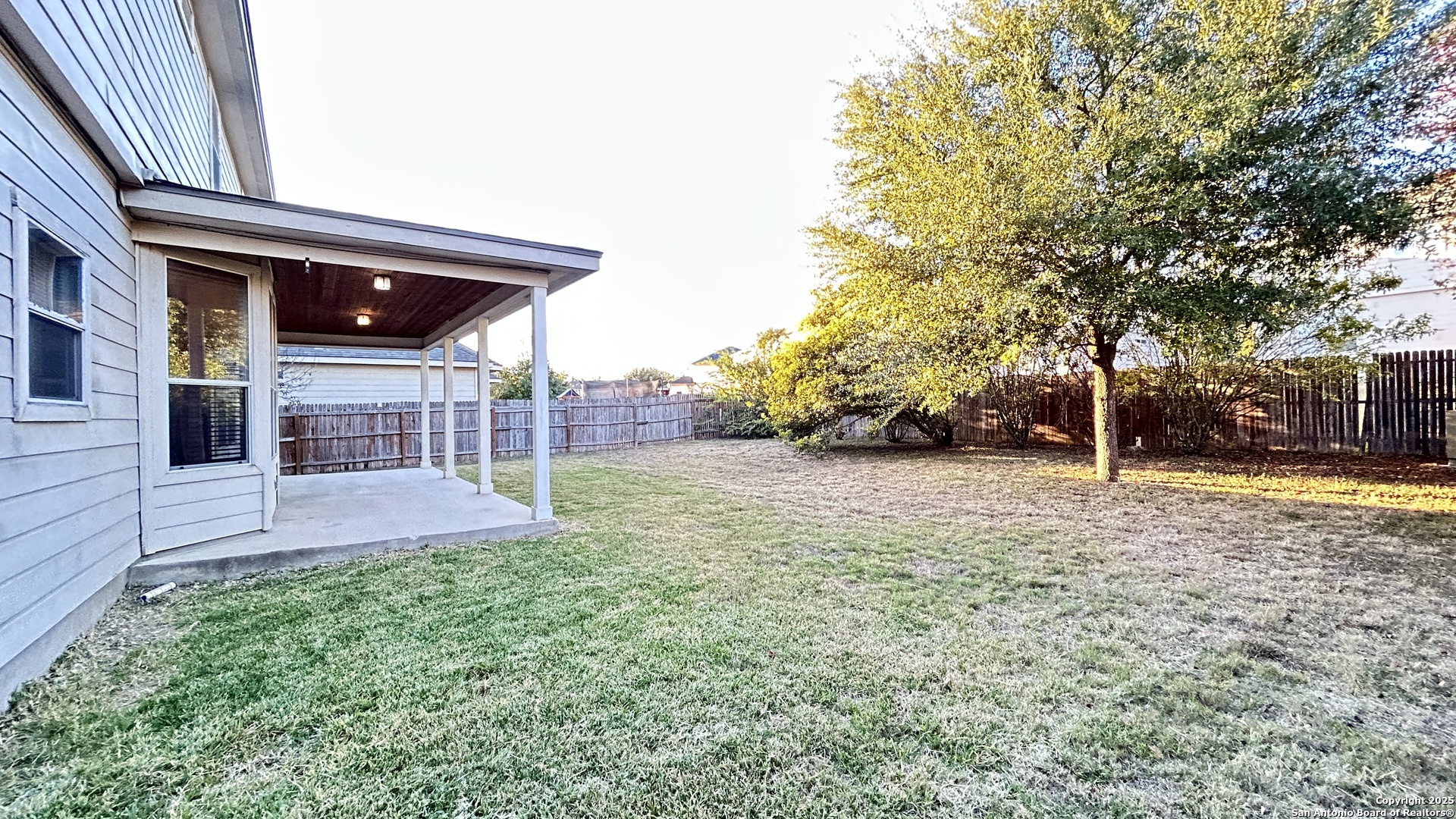 11015 Mustang Spring San Antonio, TX 78254 - Photo 29 of 29 a view of a house with a yard