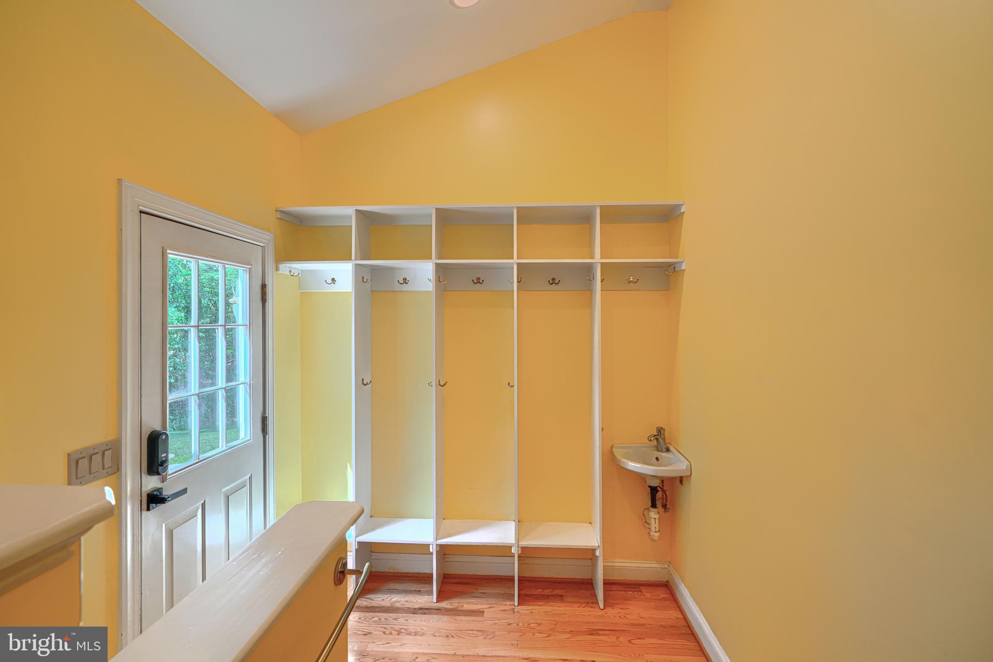 13908 Foxland Road Phoenix, MD 21131 - Photo 17 of 49 1st floor laundry with built ins and dog bath