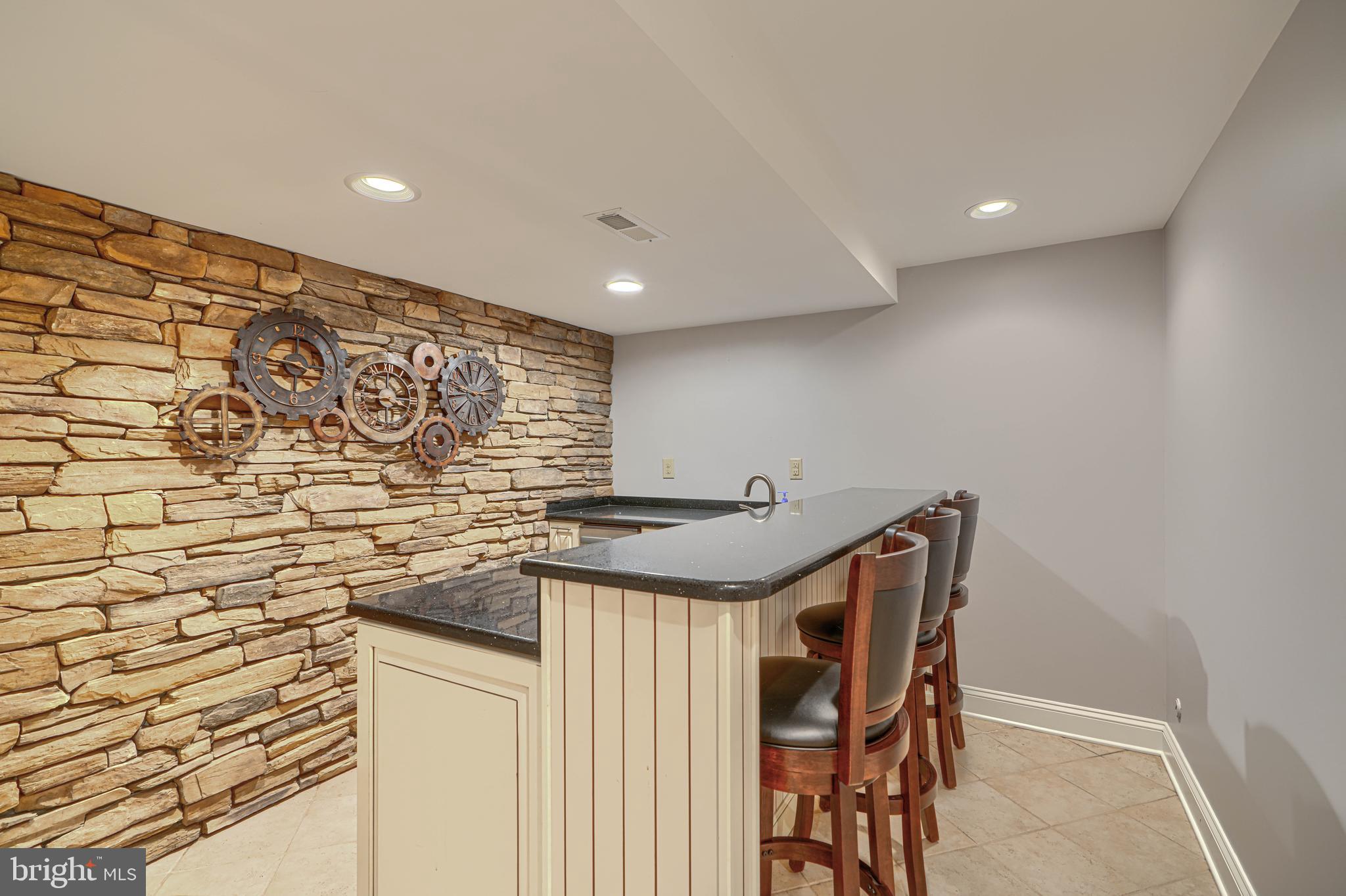 13908 Foxland Road Phoenix, MD 21131 - Photo 39 of 49 Lower-level family/rec room with wet bar