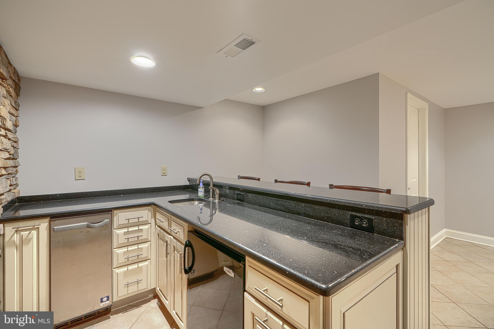 13908 Foxland Road Phoenix, MD 21131 - Photo 40 of 49 Lower-level family/rec room with wet bar