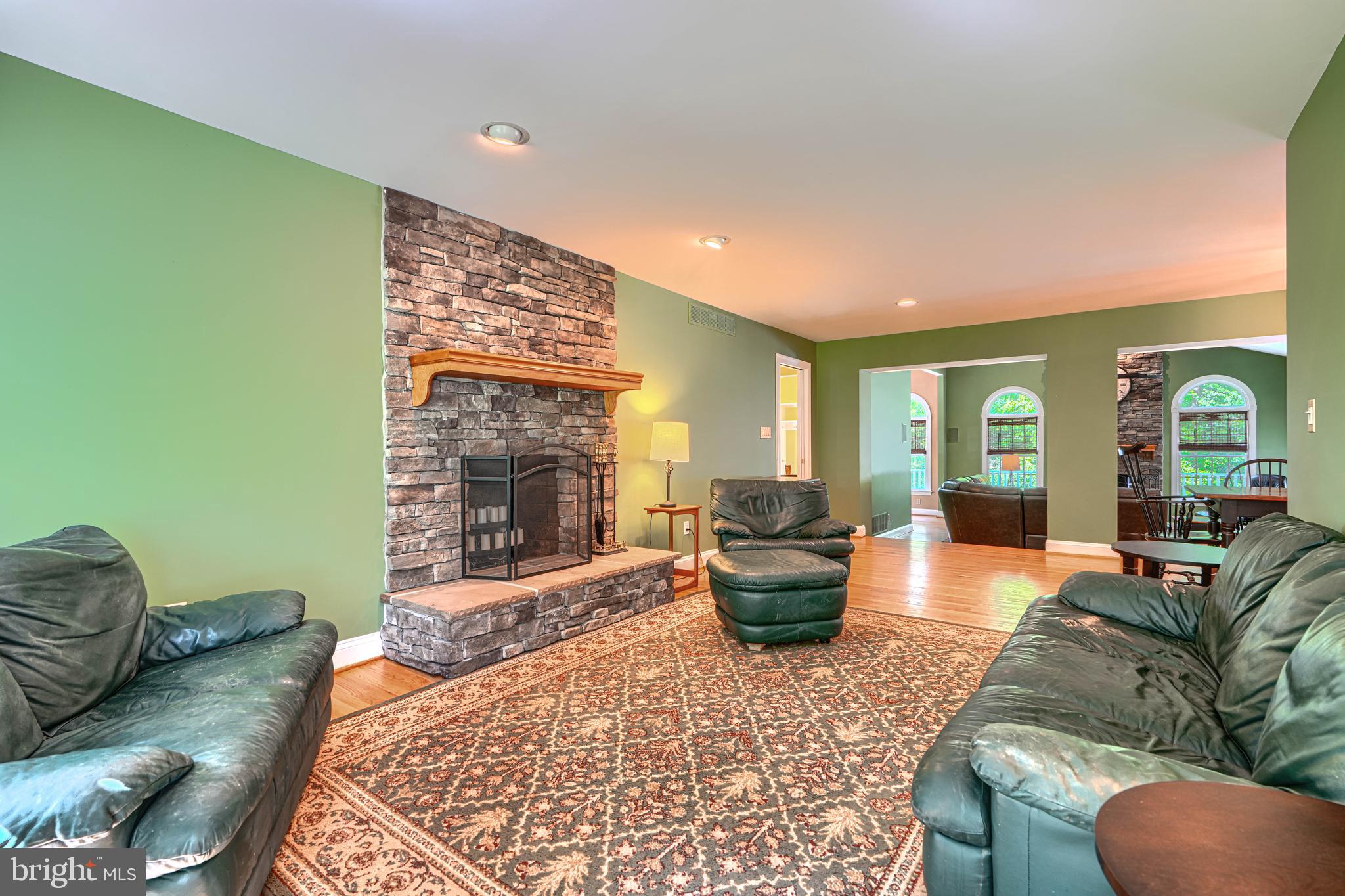 13908 Foxland Road Phoenix, MD 21131 - Photo 6 of 49 1st Floor Den with wood burning fireplace
