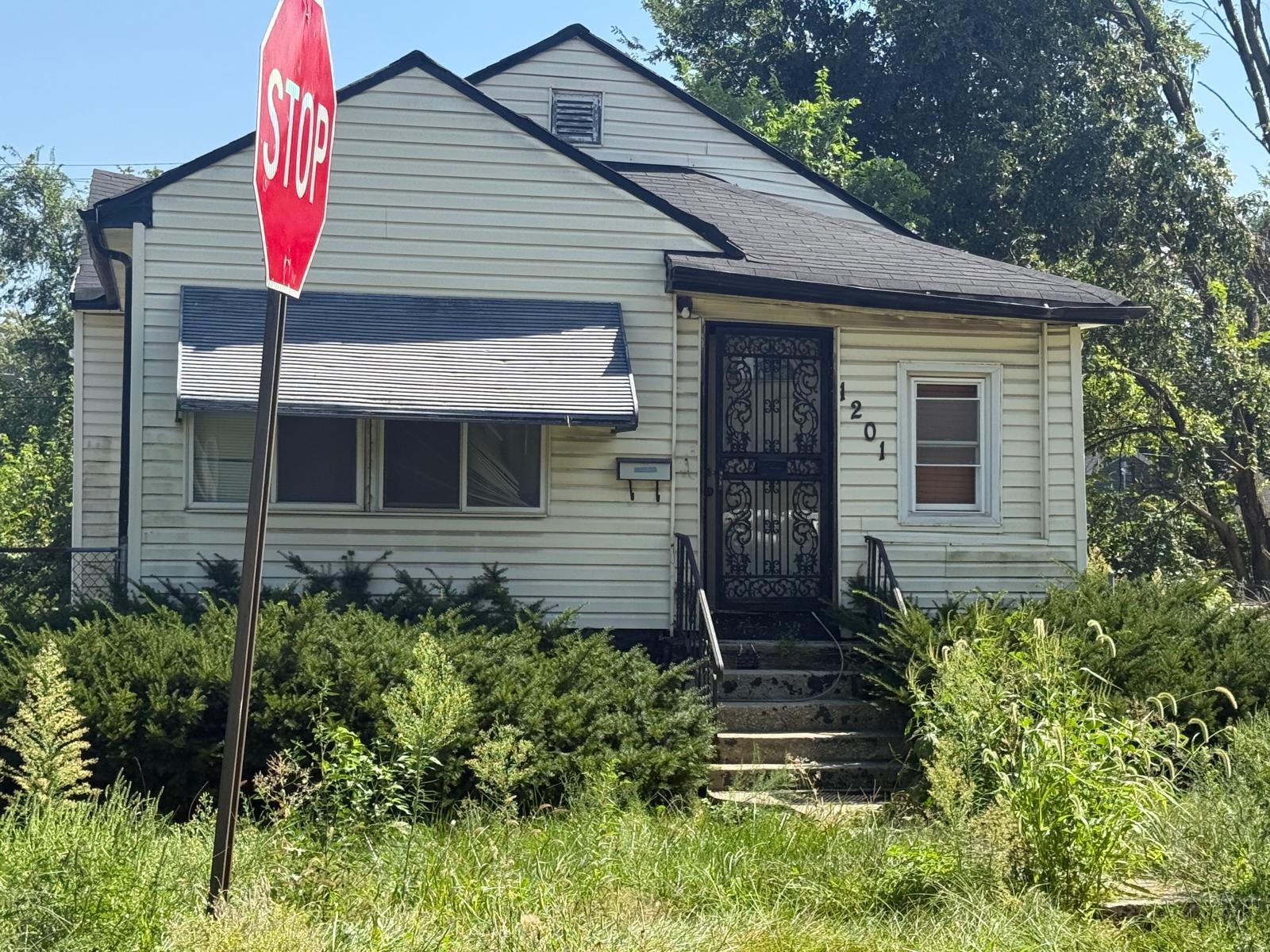 a front view of a house with yard