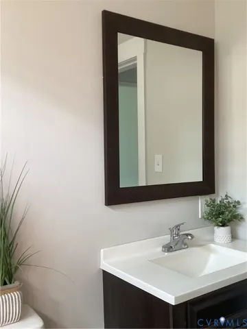 a bathroom with a shower a toilet and a shower