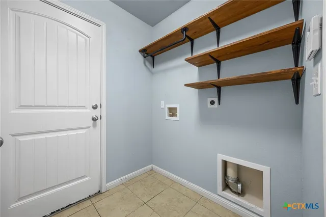 a view of a room with rack on the wall