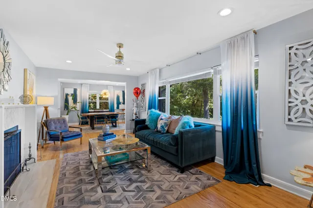 a living room with furniture and a window