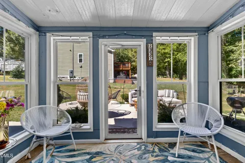 a view of a livingroom with furniture