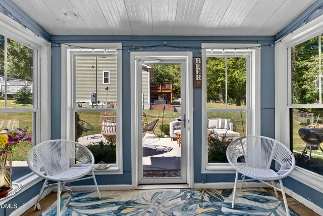 a view of a livingroom with furniture