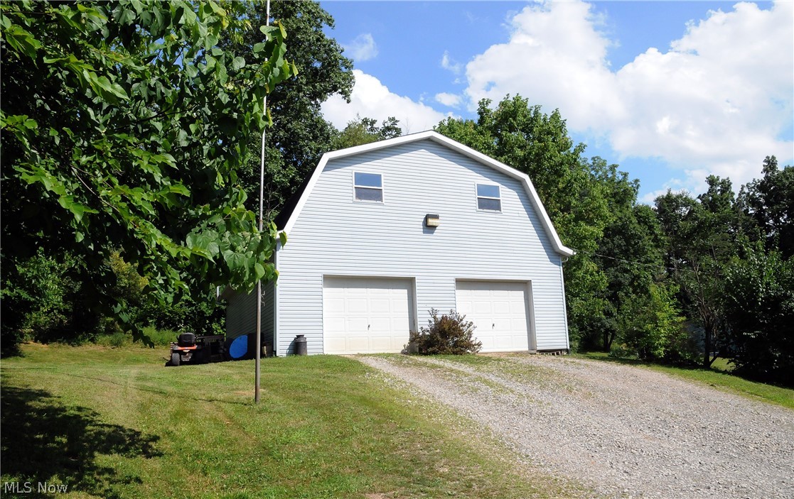 49600 Archer Road Caldwell, OH 43724 - Photo 22 of 35 4-car garage with bonus rooms
