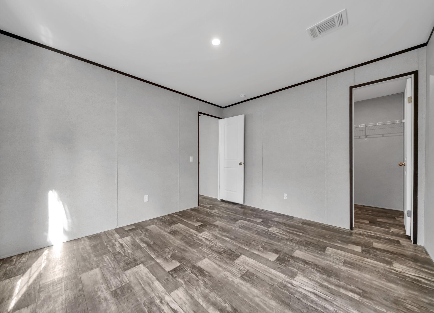 163 Gregory Dean Lane DeFuniak Springs, FL 32433 - Photo 9 of 24 a view of an empty room