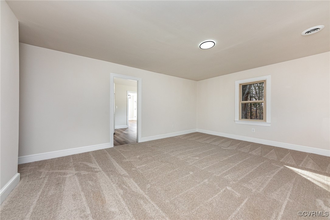 9810 Cross County Road Mineral, VA 23117 - Photo 7 of 23 View of carpeted empty room