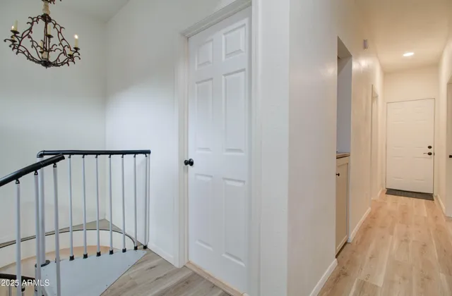 a view of a hallway with a window