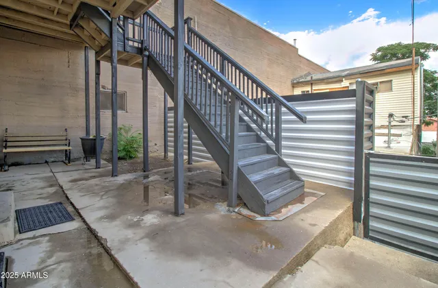 a view of staircase with wooden floor and stairs