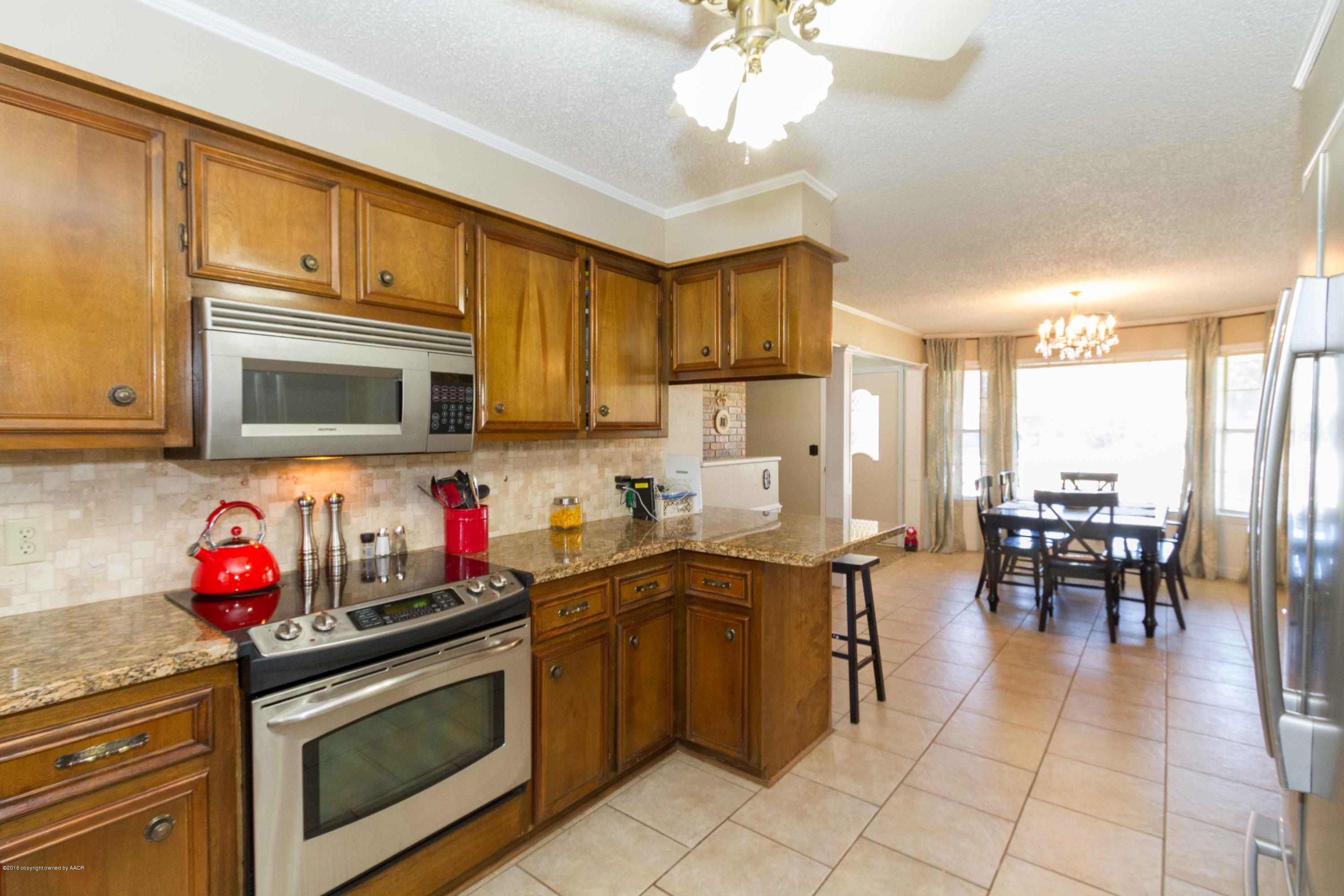 7212 Gainsborough Road Amarillo, TX 79106 - Photo 7 of 23 KITCHEN VIEW 2