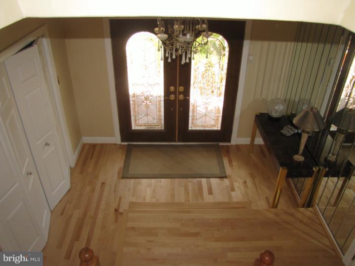 217 Sandringham Road Cherry Hill, NJ 08003 - Photo 2 of 25 a view of entryway with wooden floor