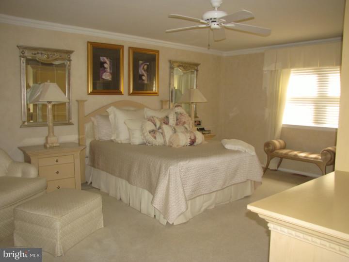 217 Sandringham Road Cherry Hill, NJ 08003 - Photo 13 of 25 a bedroom with a bed and a couch