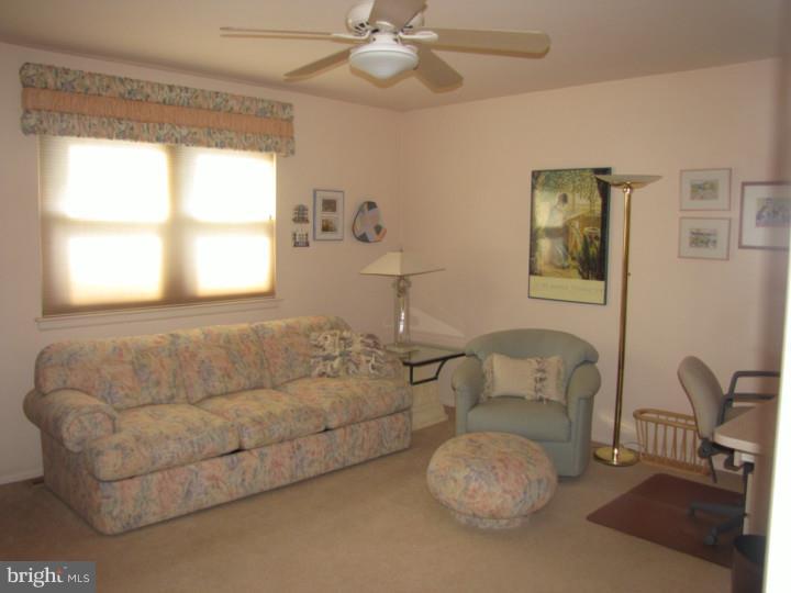 217 Sandringham Road Cherry Hill, NJ 08003 - Photo 18 of 25 a living room with furniture and a window