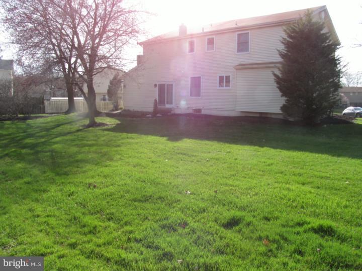 217 Sandringham Road Cherry Hill, NJ 08003 - Photo 25 of 25 a front view of house with yard and trees