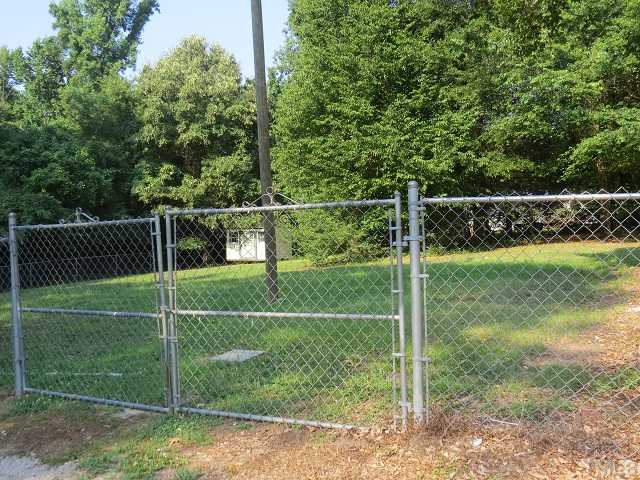 1504 Old Maple Drive Raleigh, NC 27610 - Photo 14 of 20 Fenced back yard with small shed.