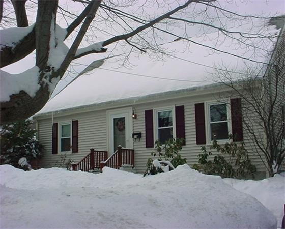 49 Topsfield Road Ipswich, MA 01938 - Photo 1 of 1 a view of a house with potted plants and a table and chairs