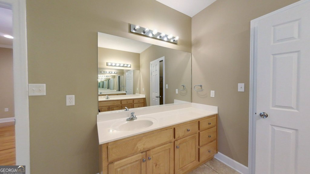 101 Willow Ridge Circle Thomasville, GA 31757 - Photo 37 of 92 a bathroom with a sink and a mirror