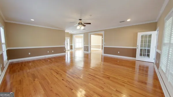 a view of a porch with wooden floor