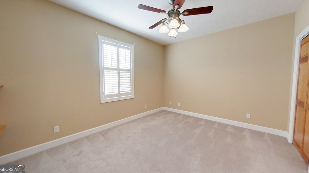 101 Willow Ridge Circle Thomasville, GA 31757 - Photo 56 of 92 an empty room with a window and a fan