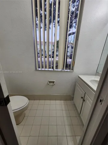 a bathroom with a toilet