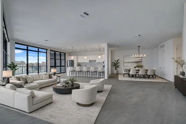 a living room with furniture and a table