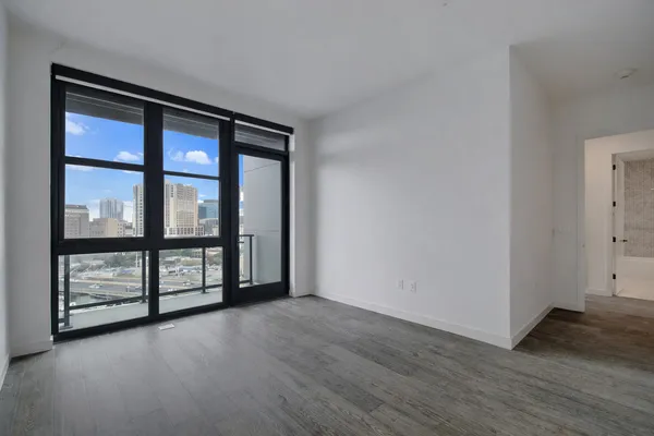wooden floor and windows in an empty room