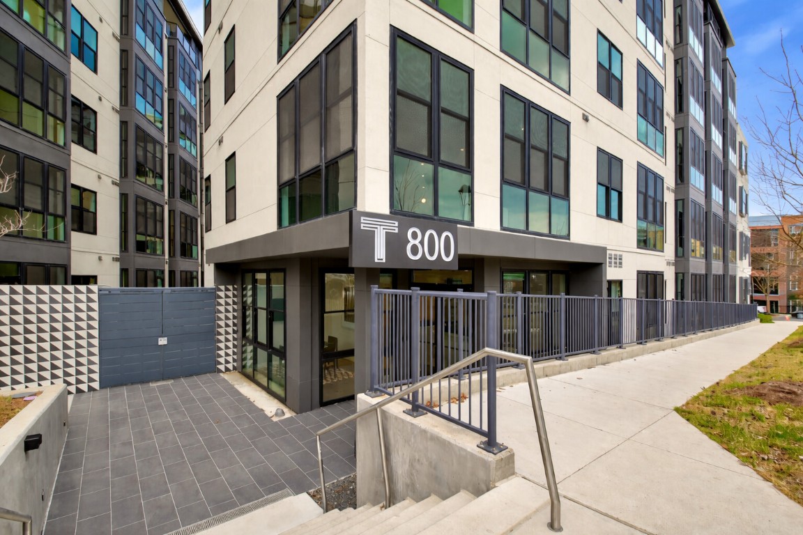 800 Embassy Drive, Unit 606 Austin, TX 78702 - Photo 36 of 38 a view of a building with a outdoor space