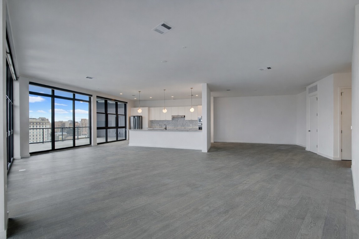 800 Embassy Drive, Unit 606 Austin, TX 78702 - Photo 5 of 38 a view of an empty room with a window