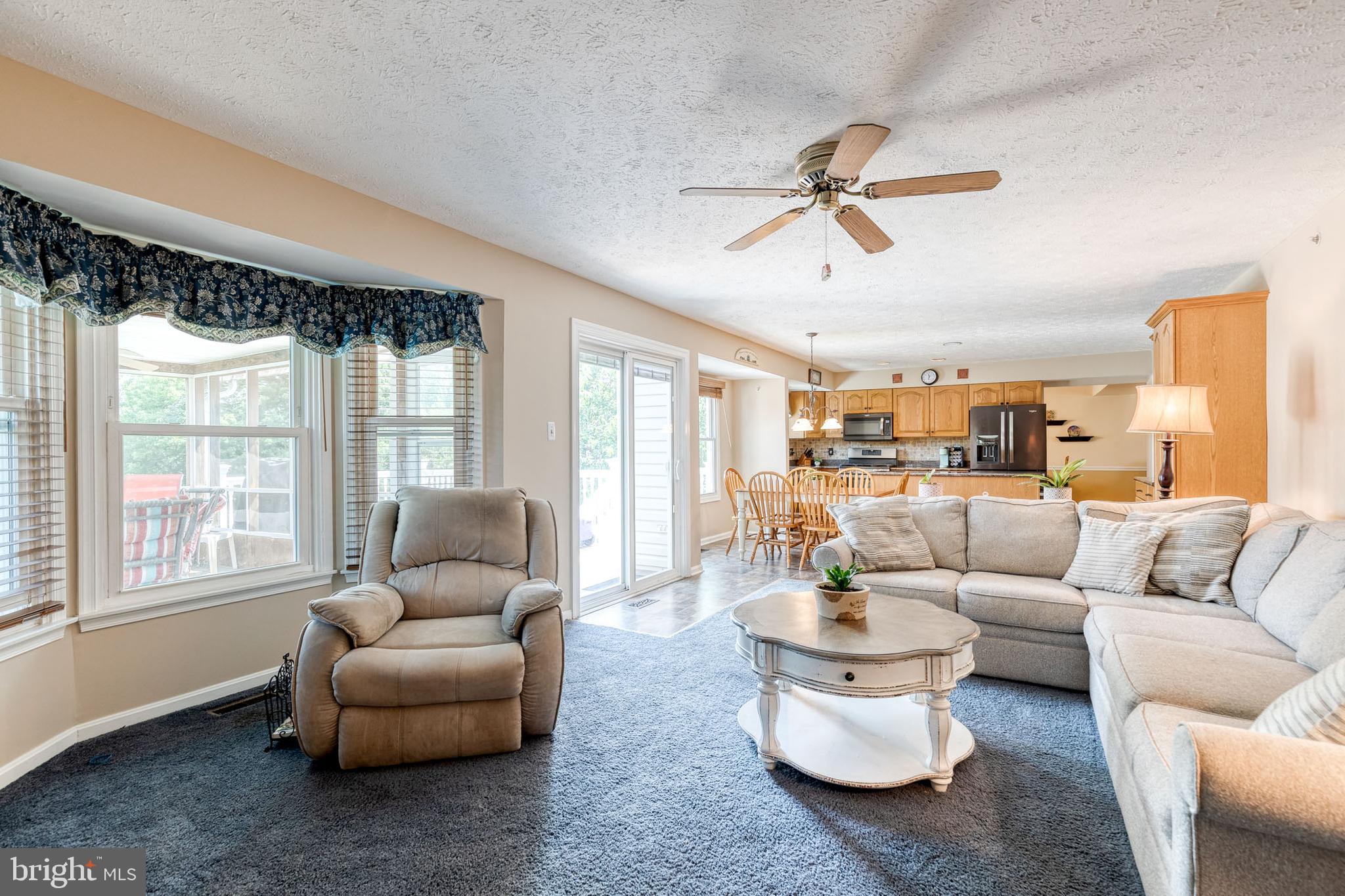 16 Perry Ridge Court Baltimore, MD 21237 - Photo 19 of 45 a living room with furniture and a large window