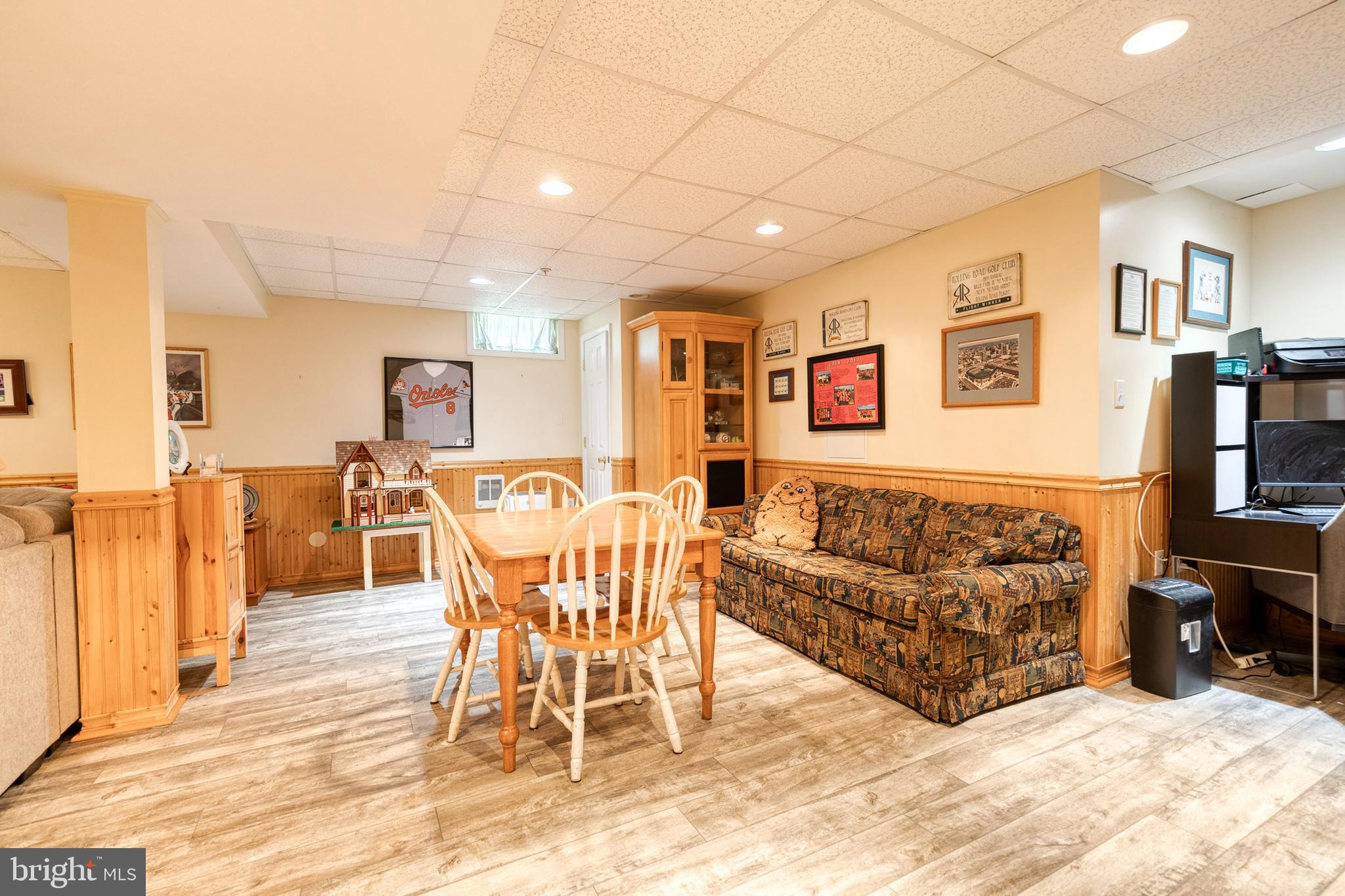 16 Perry Ridge Court Baltimore, MD 21237 - Photo 33 of 45 a living room with furniture and wooden floor