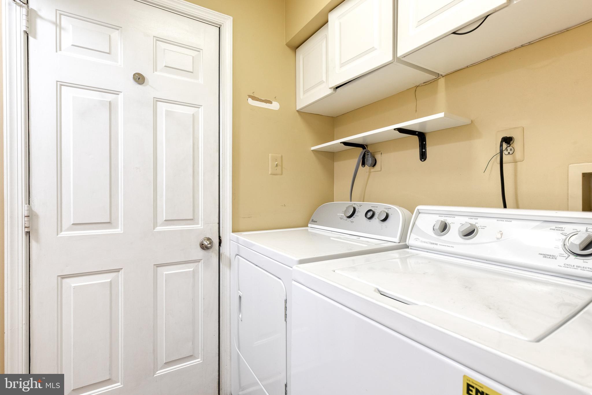 16 Perry Ridge Court Baltimore, MD 21237 - Photo 36 of 45 a utility room with dryer and washer