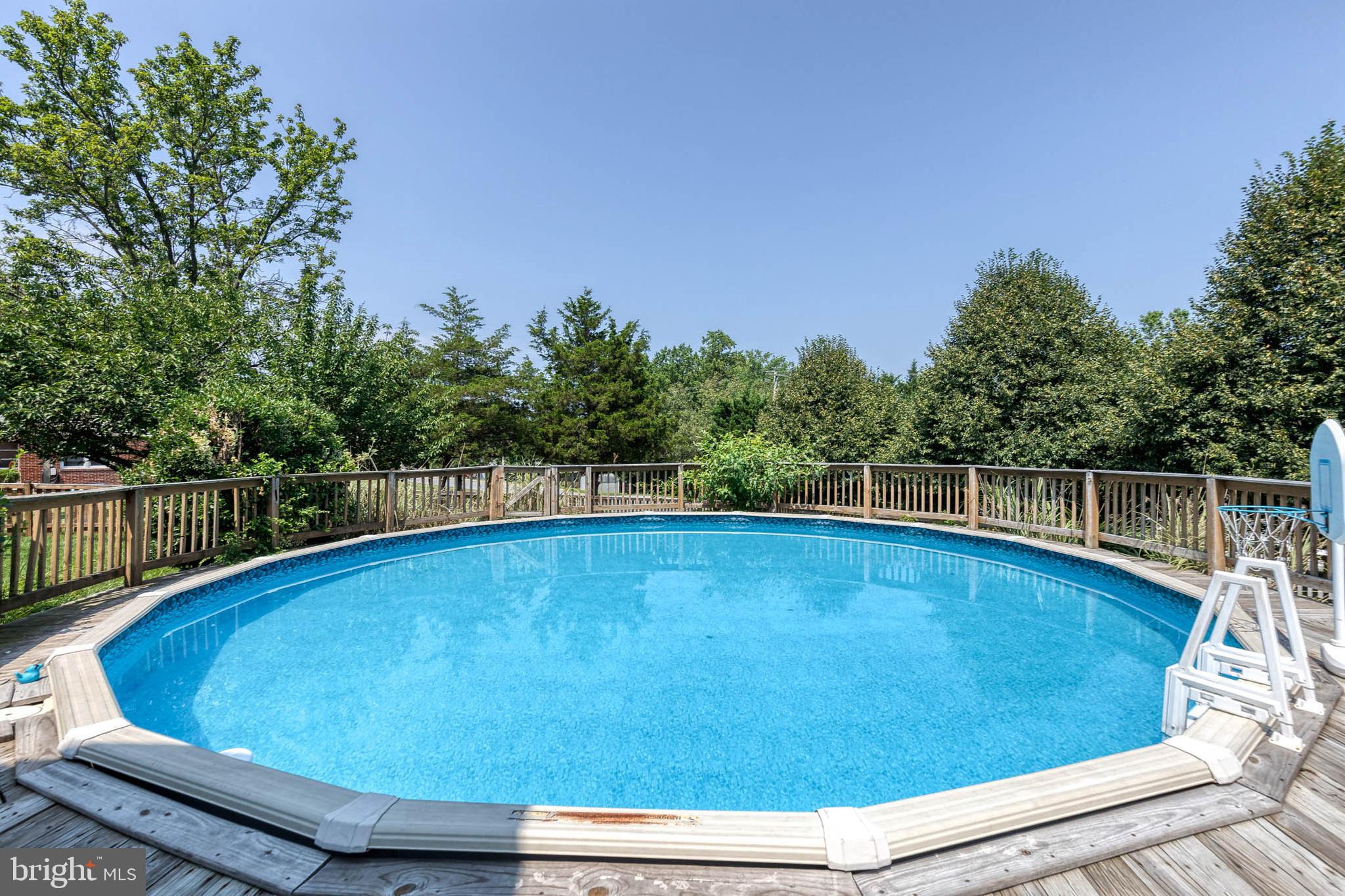 16 Perry Ridge Court Baltimore, MD 21237 - Photo 45 of 45 a view of a swimming pool with a yard