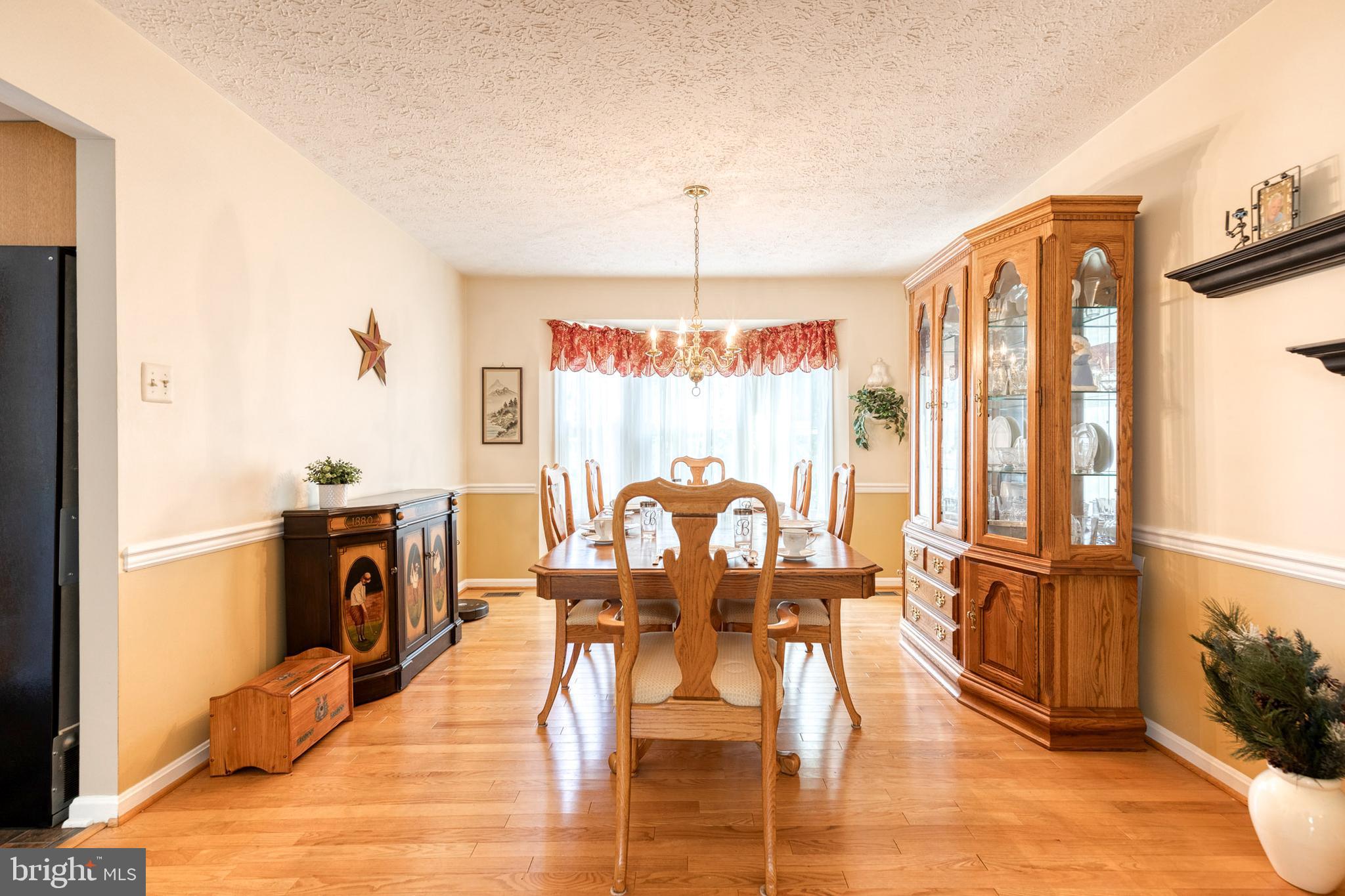 16 Perry Ridge Court Baltimore, MD 21237 - Photo 7 of 45 a view of a livingroom with furniture window and wooden floor