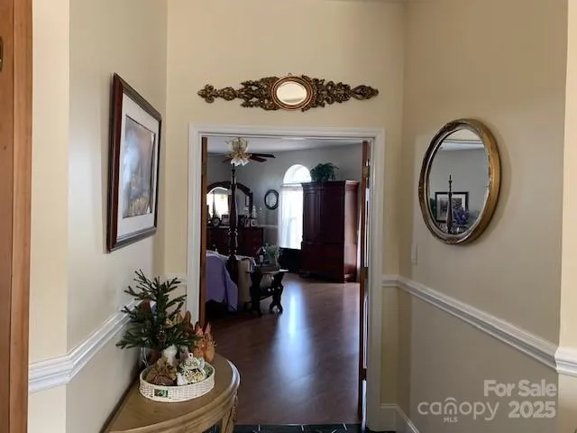 a view of a city from a dining room with large windows