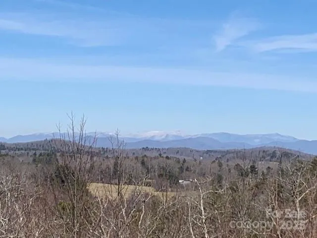 a view of lake with mountain